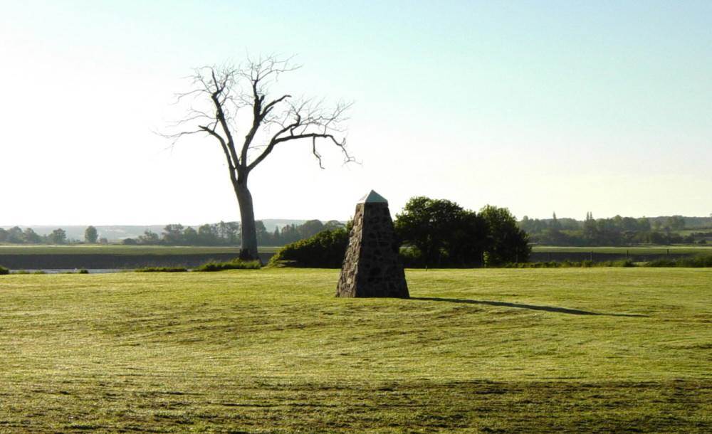 Horton Landing: The new Iron Cross location is between the monument and the tree