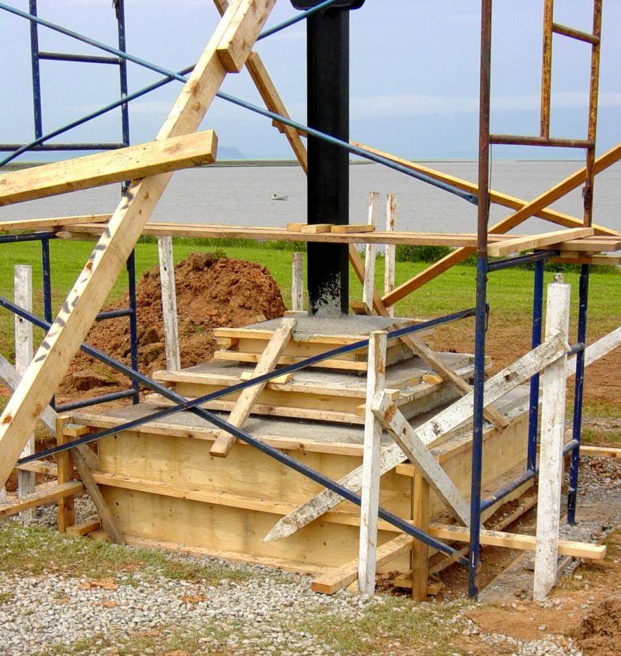 Horton Landing: The Iron Cross being installed at its new location