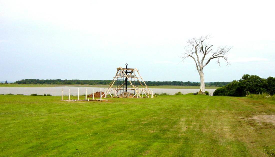 Horton Landing: The Iron Cross being installed at its new location