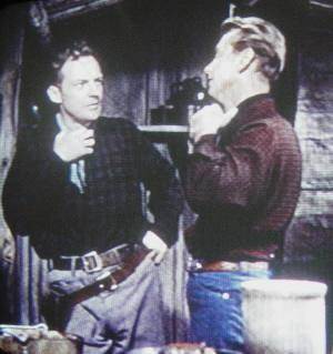 Arthur Kennedy with Alan Ladd (in Red Mountain, 1951